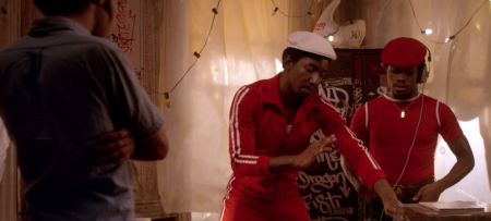 Shao trains with Grandmaster Flash as Zeke looks on.
