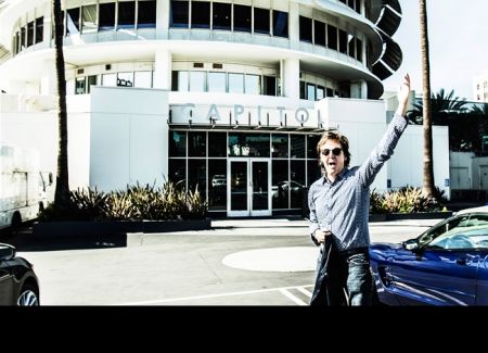 Paul McCartney is returning to Capitol Records. He's shown here at the historic Capitol tower in Los Angeles. 
